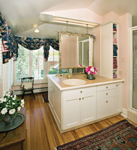 Kathy’s bathroom is part of an addition completed approximately 20 years ago, prior to Donn and Kathy’s occupancy. It’s one of the few rooms with modern accoutrements, like facing vanity sinks and contemporary cabinetry.