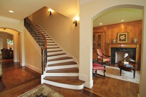 The sconces lead your eyes up the stairs, a focal point in this entry. 