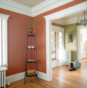 These entry and corner spaces boast strong wall colors that contrast nicely with the crisp white trim. Painting the ceilings a third color adds warmth, and directs the eye to the detailed ceiling trim. Using different wall colors defines each space as separate, but using the same ceiling and trim colors provides continuity.