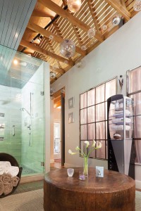 The glass bulbs and ultra-chic shower in the master bath add contemporary touches.