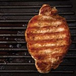 When cooking with a spice rub, first sear the meat at high temperature, using either a cast-iron skillet or a plancha, before grilling it over indirect heat.