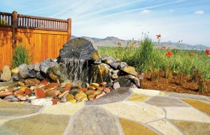 This landscape design by Ecoscape Environmental Design takes advantage of water, an important aspect of a spiritual garden. (photo by Ecoscape Environmental Design) 