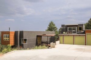  Lieff designed her black-stucco dream home while she was studying environmental design at CU. She lived in the 400-square-foot guesthouse above the green garage for two years while waiting for the home’s fraught construction process to be completed. (photo by Paul Weinrauch)