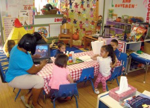 Preschool director Romana Thomas uses both technology and creativity to educate her students. (photo by Emma Smith)