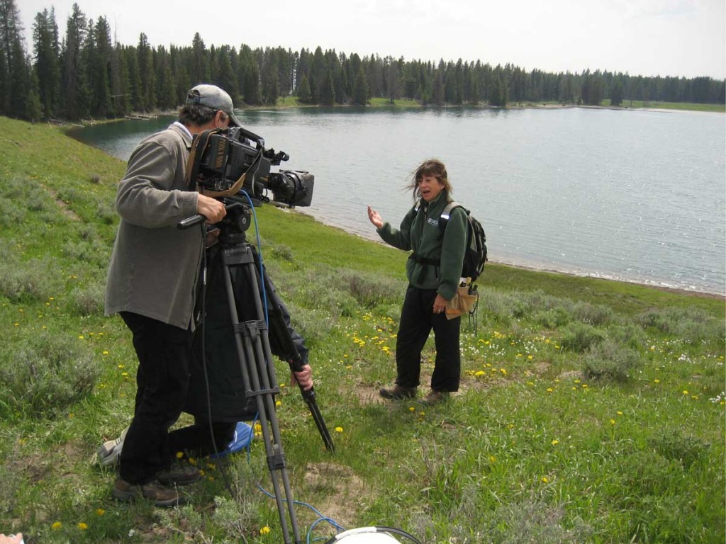 Volcanologist Lisa Morgan Morzel with a BBC crew in 2008 at Yellowstone National Park. The park’s hot, bubbling mud pots, steaming vents and gushing geysers collectively comprise half of the planet’s geothermal features, packed into less than 3,500 square miles. (Photo by Heidi Koontz)