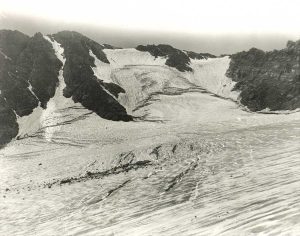 Above, left and right: Junius Henderson, founder of CU’s natural-history museum, studied the Arapaho Glacier for years and took these early photos. Although people once hiked and picnicked on the glacier, it’s been closed to the public since 1920. (Photos by Junius Henderson. From the Glacier Photograph Collection, Boulder, Colorado, USA: National Snow and Ice Data Center, digital media.