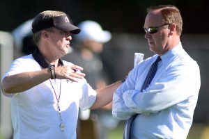 Coach Mike MacIntyre (left) and Athletic Director Rick George. (photo courtesy CU Athletic Department)