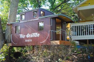 Helmstead designed and built this railroad-themed treehouse in a Louisville backyard. (photo courtesy Ed Helmstead)