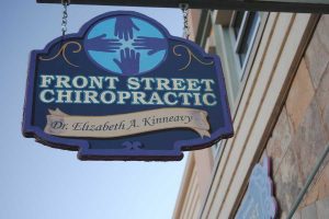 Ed Helmstead’s hand-painted signs include Front Street Chiropractic (now located in Lafayette). (photo courtesy Ed Helmstead)