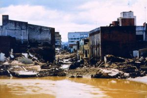 Flood damage along the Choluteca River in Tegucigalpa, Honduras, caused by Hurricane Mitch in 1998. Over 9,000 deaths and 9,000 missing were attributed to Mitch, making it the second-most deadly hurricane in history, ranking only below a 1780 hurricane in the Lesser Antilles. (photo by Debbie Larson, NWS International Activities, NOAA Photo Library)