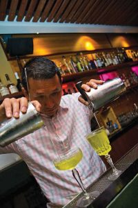 Making the perfect pour at The Bitter Bar. (photo by James Lee)